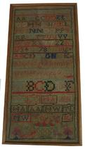 X14 Early 19th century American Sampler from Frederick Maryland, with great colors, with the Initials M.W and J.C. with a basket of flowers and  hearts and trees and Dog . Measurement are 8 7/8" x 17 7/8" long