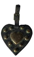 **SOLD** RM1562 Civil War era heart-shaped brass and leather Martingale with original leather strap and buckle. This style of Martingale adorned the breast plate of Civil War saddles. Brass shaped heart is applied to a heart-shaped leather pad encircled with nine large round headed tacks and stamped leather border around the edges. Great condition! Measurements: Outer leather pad is 4 tall x 3 ¾ wide and 6 ¼ tall with leather strap. Brass center heart is 1 ½ wide x 1½ tall.