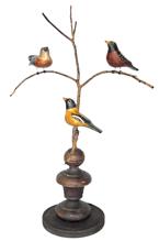 **SOLD** K1720 Handmade 20th Century Folk Art Bird Tree with three different, beautifully hand carved and polychrome painted wooden Songbirds resting on steamed and bent branches. Mounted in a tapered wooden turned base for display purposes. Signed, and branded on bottom, "Ken Kirby".  Approximate measurements: 6 ¼ bottom diameter x ~13 ½ across widest limbs x 21 ¼ tall. 