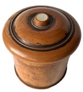 K195B Pennsylvania turned wooden treenware spice container / trinket box featuring a threaded, slightly domed lid adorned with inlaid mother of pearl at the top button and a narrow rim foot. This style of container is attributed to the Lancaster-Lebanon County region of Pennsylvania. The wood appears to be maple with a smooth lacquered finish.  Measurements: 3 diameter across lid x 3 tall   