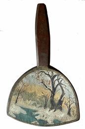 H484  19th century hand painted wooden butter paddle depicting a snowy landscape scene with barren trees alongside an icy body of water with faint outlines of snow-covered roofs of houses in the background. 