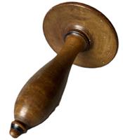 K195C Wooden Sock Darner - possibly Shaker - bearing faint remnants of black painted bands around the top and bottom of the threaded handle as well as along the edge of the top. Mushroom shaped top bears wear from many years of use. The wood appears to be maple with a lacquered finish. Measurements:  2 5/8 diameter (top) x 4 ½ long