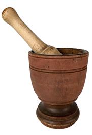 K81 Beautiful 19th century Pennsylvania mortar and pestle bearing its original dry, red painted surface. 