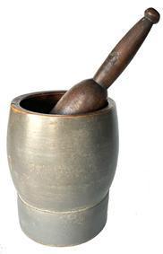 J234 19th century original gray painted Mortar and Pestle.  Each part is turned from one solid piece of wood. Both the pestle, and the interior of the mortar, retain wonderful natural patina. Very sturdy with good weight. No cracks. The Mortar measures 8 tall x 6 diameter bottom with a 2 1/4 wide band around the bottom before the sides curve around the bowl and taper back in to a 6 ¼ diameter top. Pestle appears to be original to the mortar and measures 12 long with wear indicative of years of use.