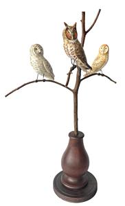 K108 Handmade 20th Century Folk Art Owl Tree with three different, beautifully hand carved and polychrome painted wooden Owls resting on steamed and bent branches. Mounted in a tapered wooden turned base for display purposes. Signed, and branded on bottom, "Ken Kirby". Approximate measurements: ~15 across widest point x ~ 22 at tallest point. Bottom of base is 5 3/4" diameter. Owls are each approximately ~1 1/2" wide - ~5 tall/long  