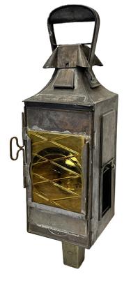 K74 Rare Two-way Railroad signal lantern marked L. Dorvaux Paris 1901 with removeable thick, yellow-colored textured glass panels. Multiple manufacturers are also identified in different areas of this lantern as the kerosene insert is marked EUG. HALARD Paris on the front and POYARD on the wick raiser knob. Tin and brass. Evidence of early metal repairs  however they do not affect the integrity of the lantern.  Very sturdy, heavy lantern in good condition. Measurements: 5 ¼ square x 19 ½ tall.