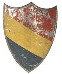 K123 Toy / Theatrical Tin Shield bearing its original painted surface boasting diagonal sections of red, yellow and blue with the outer edge bordered with a faded metallic color. Great rolled edges and original surface with wear indicative of use. There are two rounded metal brackets with nicely rolled edges soldered onto the back for handholds / placing an arm through. Measurements: 13 wide x 19 tall. Top bracket on back measures 2 deep and the bottom one measures 3 ½ deep.