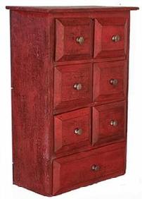 B423 Seven drawer Spice Cabinet featuring six small drawers over one large drawer configuration with old crackled red painted surface. Simple nail construction. Circa 1880. Measurements: 12 ½ wide x 6 deep x 17 ½ tall