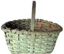 K1627 Early hand-woven splint basket featuring a double-wrapped double-rim with notched, steamed and bent handle in its original green painted surface. The oval top opening tapers to a rectangular shaped bottom. Natural patina interior. Very sturdy basket. Measurements: 16 ½ x 12 oval top opening. The rectangular bottom measures 10 ½ x 9 ½. Sides are 6 ¼ tall. Overall height at handle is 12 tall.