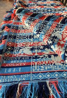 G719 Spectacular, early 19th century Pennsylvania Linsey-Woolsey Coverlet identified and dated in all four corners: Mountairy Berks County 1841 Mary Ann Simmers. Comprised of red and two shades of blue wool woven over linen to create exquisite patterns that are reversible.