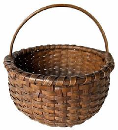 H479  Exceptionally well made, tightly hand-woven gathering basket with single wrapped rim and footed base. Deeply notched, sturdy, steamed and bent handle is woven into the sides of the basket. Woven bumped up bottom interior to enhance airflow for gathered items. 