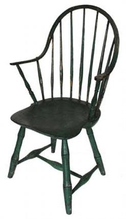 **SOLD** D36 Lancaster County Pennsylvania Continuous Arm chair retaining its old green paint. Bamboo style turned legs with a nice saddle seat typical to the late eighteenth century.