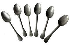 J198 Set of six (6) matching 18th century American pewter spoons. One spoon has the initials AR carved on the back of the handle tip. All spoons measure approximately 8 long, with the exception of the initialed one which shows the most wear and measures 7 ½ long.