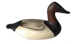 J98 Miniature Charles Barnard high-head Canvasback decoy carved by Lloyd Cargile  solid wood, branded on bottom LC  Approximate measurements: 5 ½ long x 2 ½ wide x 3" tall. 