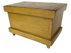 K44 Sweet 19th century Pennsylvania miniature Blanket Chest with original mustard painted surface. Applied molding around both top, and bottom  resting on tapered applied feet.  Clean, natural patina interior. The wood is pine. Circa 1870s. Measurements: 8 5/8 wide x 5 ¼ deep x 5 ¾ tall  