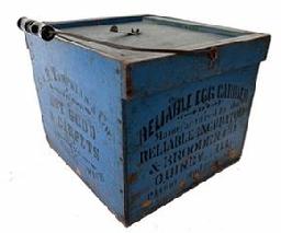 RM1348 Late 19th century Egg carrier with the original blue paint and black stenciled advertising. The following advertisements,  Geo B. Tompkins and Co Dry good and Carpet, Sturgis Mich. Reliable Egg Carrier Brooder Co. Quincy Ill 