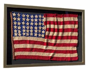 RM1464 Nice, hand crocheted 48 Star Flag - with very detailed individually applied crocheted stars. Has been professionally mounted and framed. Framed Measurements: 24 1/4 wide x 16 1/2 tall x 1 deep 