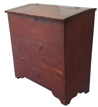 **SOLD** C474 19th century Storage Bin from Pennslyvania, with originnal red paint, lift lid, with a slight canted front, square head nail construction, with a nice high cut out foot. circa 1870