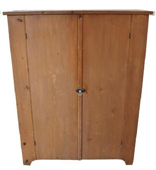 C399 19th century Pennslyvania two door storage Cupboard from Mount Joy Pa. circa 1850 with the original numeg paint, with a nice cut out foot