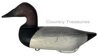  RM1051 Early Bob McGaw Canvasback Drake decoy. Paint is a second coat of working paint, also done by McGaw. Original dog bone weight and iron ring on bottom.