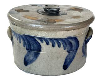 K1816 19th century beautiful Cobalt decorated cake crock with lid attributed to Richard C. Remmey of Philadelphia, PA - who was a prominent stoneware maker from the 1860s  1900.  The cylindrical form is heavily cobalt decorated on all sides with swags and highlights at the lug handles. Incised rings at the tooled shoulder add to the visual appeal. The lid is also decorated with typical cobalt Remmey swags/florals. Measurements: 8 ¾ diameter x 4 ¾ tall (6 tall with lid). 