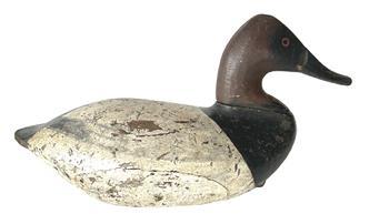 **SOLD** RM1379 Canvasback Drake Decoy by John Graham (1822-1912) of Charlestown, Maryland. Branded GRACE on bottom. Retains nice, early working re-painted surface with evidence of being shot over. Original iron weight, staple and ring intact on bottom.