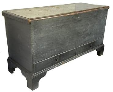 **SOLD** H1044 18th century Pennsylvania original pewter gray painted pine blanket chest with a dovetailed case and two dovetailed drawers resting on a high applied bracket base. Rosehead nail construction. Clean, natural patina interior with a small glove till. Original, unusual ring pulls on each drawer. Circa 1750s. Measurements: 54" wide x 21" deep x 30" tall