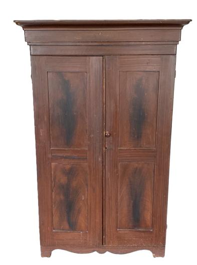 K1530 19th century Pennsylvania two door wardrobe with original paint decorated surface boasting paneled doors and ends, resting on a decorative cut out base. Molding and beaded edging surrounds the doors. Corners are rounded and top molding is removeable. Interior shelving is also removeable. Measurements: Top is 46 ¼ wide x 18 ¾ deep. Case is 40 wide x 15 ¾ deep. Overall height is 72 (6) tall. 