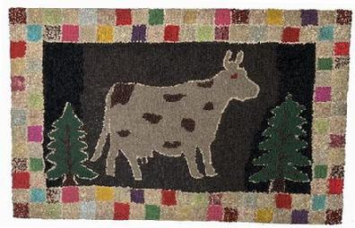 F127 19th century beautiful hand hooked rug depicting a folky cow standing between two evergreen trees on a black background. The rugs 4 border consists of a double-row checkerboard of many colors. Constructed of several types of fibers hooked into burlap.