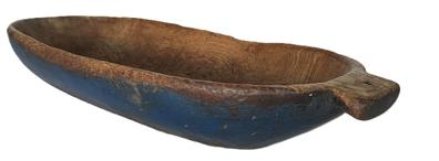 **SOLD** K293 Early 19th century oval Trencher / dough bowl with carved handles bearing gorgeous blue painted exterior and a wonderful natural patina interior with evidence of significant chop and tool marks from years of use. Circa 1830s  1840s. Hand carved from a single board.