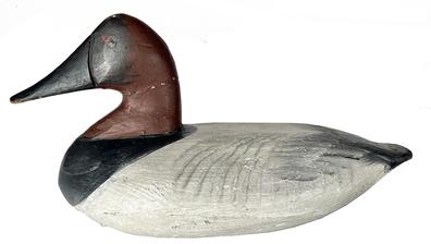 J232 Upper Susquehanna Canvasback Decoy  carver unknown. Working repaint surface. Original staple, ring and weight intact on bottom. 