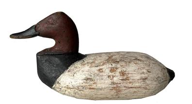 J328 Upper Susquehanna Flats Canvasback Decoy  very folky carving  carver unknown. Original weight and rigging intact on bottom.