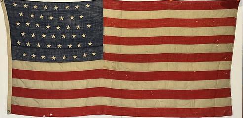 RM1445 Rare Civil War Veterans 46 Star American flag (1908-1912) with identification inscribed on the hoist edge M.P. Resch GAR  which research shows is Michael Resch of the 9th Wisconsin  who enlisted on 9/10/1861 as a Private, mustered into C Co. WI 9th Infantry on 9/10/1861,