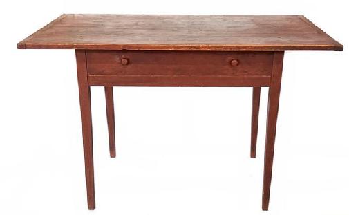 H184 Early 19th century original red painted work table featuring a two board rectangular top with breadboard ends, over single- dovetailed drawer, raised on very fine tapered legs. circa 1820