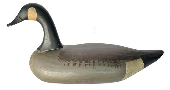 J239 Goose Decoy J239 Rare full size Goose decoy carved by Joseph Evans McKinney (1913-2000) Elkton Maryland. Original paint, double weighted. McKinney didnt make many Geese. Circa 1950.