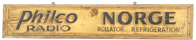 **SOLD** G658 arly trade sign advertising Philco Radio and Norge Rollator Refrigeration in original black letters with mustard yellow shadowing on a pale yellow background. Molded framed edge with hangers for hanging. Yellow pine wood. Double sided sign, one side is weathered. Circa late 1920s