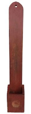 M76 19th century New England Scouring Box in original red paint. Tall tombstone shaped back with center hole for hanging. Canted sides on box, with a circular concave area where the lye soap would rest when drying.  The wood is pine with square head nail construction. The back has �BLENHEIM PIPPIN� stenciled in faint black paint � indicating this item may have been made with heavy duty apple crates. Measurements: 4 &frac12;� wide (back) x &frac34;� thick x 35 &frac34;� tall. The box portion is 6 1/8� wide x 4" deep x 7 1/8� tall (front) x 8 5/8� tall (back). 
