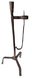 L251 18th century rare, non-adjustable hand forged Wrought Iron Rush Light with Candle Holder resting on tripod base. Unusual workmanship with arm being mortised through the stem. Circa 1750 � 1780. Great surface! Measurements: ~7 &frac12;�-8� across feet x 19 &frac14;� tall. 