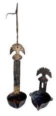 L408d Rare � 18th century hand wrought iron Phoebe Double Cruise Lamp / Whale Oil Lamp / Grease Lamp / Betty Lamp with decorative cutouts on back and twisted iron hanger. The bottoms of both lamps are marked �X X�. This was a very early type of lamp commonly used in America between the 17th to early 19th century, consisting of two small iron bowls hanging one above the other, with a spout to hold something to act as a wick (twisted cotton rag, rush, etc.). The lower bowl collected drips coming from the upper bowl, creating an efficient use of the fuel being burned.  Measurements: Outer lamp measures 2 5/8� wide x 3 &frac12;� deep x 7 &frac34;� tall. The inner / smaller lamp is 3 1/8� wide x 3 &frac12;� deep x 5 &frac12;� tall. Overall height with hanger is 12� tall.  
