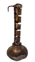 L408C Late 18th century � early 19th century Courting Candlestick constructed of spiraled forged iron with iron finger hold, mounted into a turned wooden base. Great original surface with dark patina to the wood. Approximate measurements: ~ 3 3/8� x 3 &frac12;� diameter base x ~8� tall.  