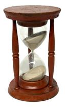 **SOLD** RM1641 Large early 20th century Hourglass bearing old red painted surface. Blown glass encradled in a wooden base and top with three turned spindles. The sand runs approximately one hour. Overall measurements: 6� diameter x 9 &frac14;� tall. 