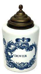 **SOLD** M281 20th century ceramic Delft lidded Tobacco Jar with traditional blue and white painted designs including a crown and foliage with �Dover� painted on the front and �Delft� and �Made in Holland� prominently painted on bottom,  The beehive shaped lid is brass. Beautiful jar with no chips or cracks visible. Measurements: 5 &frac14;� diameter x 9 &frac12;� tall to top of finial on lid. (7 1/8� tall without lid). 