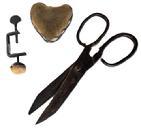 L270 Wonderful group of three sewing related items to include:  Large blacksmith made hand forged iron shears (Measurements: ~10 1/4" long x 4 5/8" wide. Center pin is approximately 1" long.) Velvet heart shaped pincushion with hand woven blue and white linsey-woolsey trim encircling the sides. Hand stitched. (Approximate measurements: 3 &frac14;� wide x 2� thick x 3� tall.) and a 19th century American Sewing Clamp - small sized - forged iron - with very worn velvet covered sawdust pincushion intact. (Measurements: 3 &frac12;� tall not including the finger screw.)  