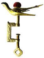 K1704 19th century American Sewing Bird Clamp with velvet covered pincushion intact. Part of the Patent date is legible on bird�s left wing ��15 1853�. There is also stamping around the edge of the bird�s right wing, however it is illegible.  All mechanics are in good working condition and the beak clamps tightly. Composition appears to be gold gilded solid brass � as a magnet does not stick. This is a great example of the first sewing bird patent that was granted to Charles Waterman of Meriden, Connecticut on February 15, 1853 � and was by far the most popular style � often called the �Waterman Bird� after its creator. Approximate measurements: 3 &frac12;� long (beak to tip of tail) x 2� wide x 5� tall.