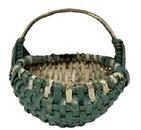 RM1646 Miniature rib and split oak hand-woven egg / buttocks basket in original  green and white painted surface featuring single wrapped rim with Eye of the Wind God detailed weaving at junction of the two major ribs that construct the handle and rim. Measurements: ~5� x ~4 &frac34;� tall.
