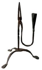 **SOLD** L237 Fantastic 19th century wrought Iron Rush Light / Candle holder with twisted center post and candle cup counterbalance arm resting on arched tripod base with pad feet. Hand forged iron.Measurements: 9 &frac12;� x 7 5/8� across the spread of the feet x 12 &frac34;� tall. 
