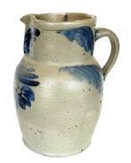 **SOLD** L356 Beautiful Pennsylvania cobalt blue decorated stoneware crock pitcher marked �1 &frac12;� Circa 1870s. Decorated with brushed cobalt swags and a flower on front and the collar is decorated with swags on each side of spout as well as the handle.