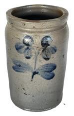 K1800 19th century Stoneware Jar � stamped �I� - boasting Cobalt Clover / Floral decoration typical of Peter Hermann of Baltimore, MD. Tall, cylindrical jar with lipped rim and tooled shoulder with a cobalt clover on both the front and back.  Good condition. Measurements: 6� top diameter x 6-6 &frac14;� bottom diameter x 10� tall. 