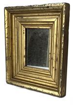 K1674 Small sized Pennsylvania wooden framed mirror boasting original gold gilded molded frame secured with tiny cut nails. Measurements: 9 &frac14;� wide x 10 &frac14;� tall x 1 &frac34;� deep.  