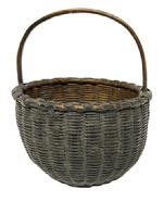 M273 Early 19th century Pennsylvania small sized hand-woven berry basket bearing its wonderful original olive green painted surface. Single wrapped double rim with tightly woven sides. The wooden steamed and bent, notched handle is sturdy and tight. In good condition with great surface. Measurements: The 6 &frac12;� � 7� top diameter diameter circular opening tapers down to rest on a 3 &frac12;� round base. Sides are 4 &frac14;� - 4&frac12;" tall, depending on where measured. Overall height at top of handle is 8 &frac14;� tall.